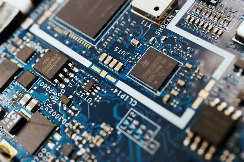 Semiconductor chips are seen on a circuit board of a computer in this illustration picture taken February 25, 2022. REUTERS/Florence Lo/Illustration