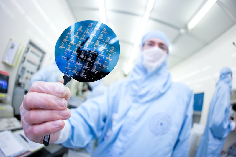 A scientist with a silicon wafer. Photo: Reuters