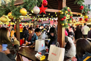 People visit a Christmas market, as Covid-19 outbreaks continue in Shanghai, China