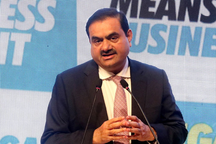 Indian billionaire Gautam Adani addresses delegates during the Bengal Global Business Summit in Kolkata