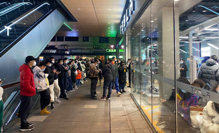 eople protest outside a Tesla showroom in Chengdu, Sichuan, China, released January 6, 2023 in this picture obtained by Reuters from social media.