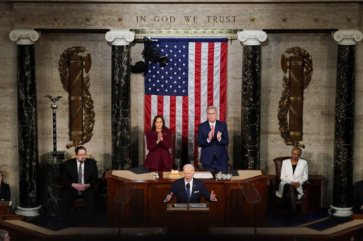US President Joe Biden delivers his State of the Union address before a joint session of Congress as Vice President Kamala Harris and Speaker of the House Kevin McCarthy applaud in the House Chamber at the U.S. Capitol in Washington, US