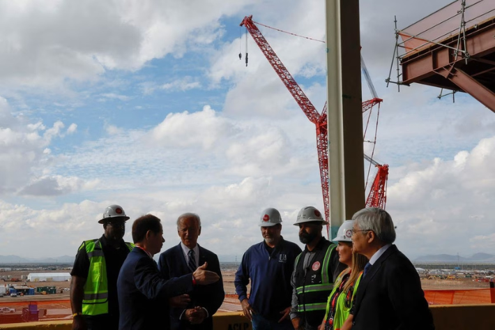 US President Joe Biden listens to Chairman of TSMC Mark Liu during a visit to TSMC AZ's first Fab (Semiconductor Fabrication Plant) in Phoenix, Arizona