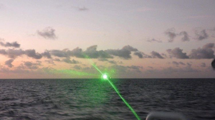 The Philippine coast guard released this image showing the green laser beam that was allegedly directed at its vessel last week in the South China Sea.