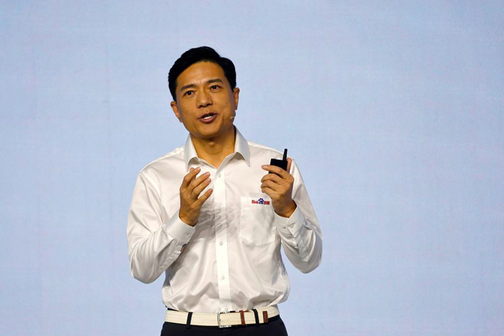 Baidu's co-founder and Chief Executive Officer (CEO) Robin Li showcases artificial intelligence-powered chatbot known as Ernie Bot by Baidu, during a news conference at the company's headquarters in Beijing, China