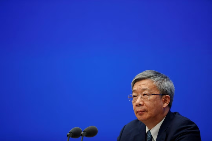 People's Bank of China Governor Yi Gang attends a news conference in Beijing, China