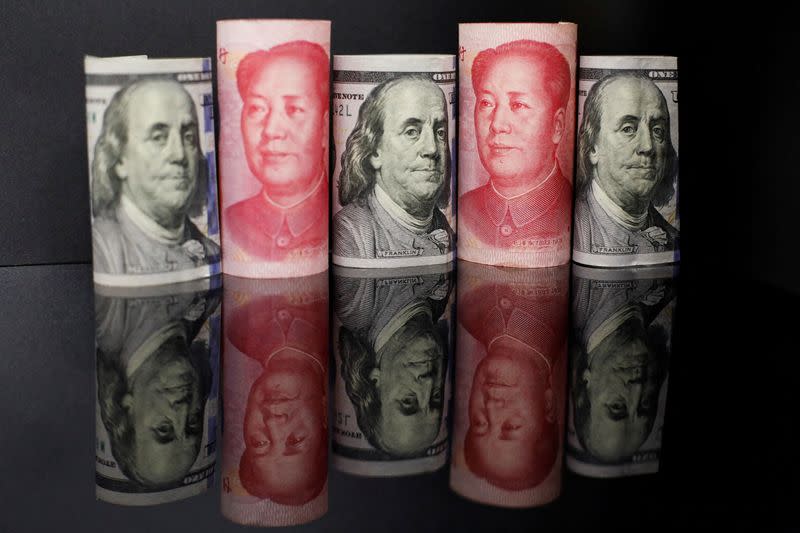 Chinese state banks were seen selling dollars and buying yuan in both offshore and onshore markets on Monday, sources said, in a bid to stop the currency from depreciating rapidly.