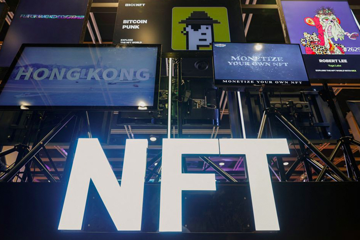 A signage for "NFT" is seen at Hong Kong Web3 Festival, in Hong Kong, China