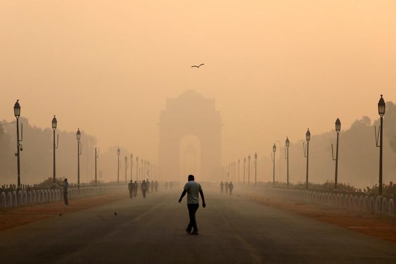 A man walks amid thick smog in New Delhi