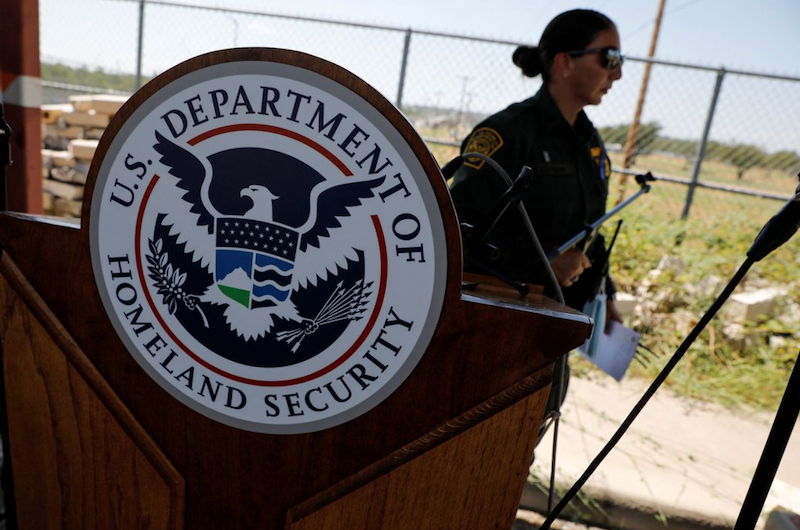 The seal of the U.S. Department of Homeland Security is seen after a news conference in Del Rio, Texas, U.S., September 19, 2021. REUTERS/Marco Bello/