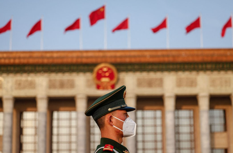 A soldier stands guard ahead of the Third Plenary Session of the National People's Congress (NPC) at the Great Hall of the People, in Beijing, China, 10 March 2023. Mark R. Cristino/Pool via REUTERS