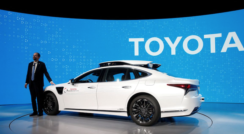 Gill Pratt, CEO of the Toyota Research Institute (TRI), poses by a research vehicle equipped with Toyota Guardian, an accident avoidance system that assists drivers, during a Toyota news conference at the 2019 CES in Las Vegas, Nevada, USA, on January 7, 2019. Photo: Reuters