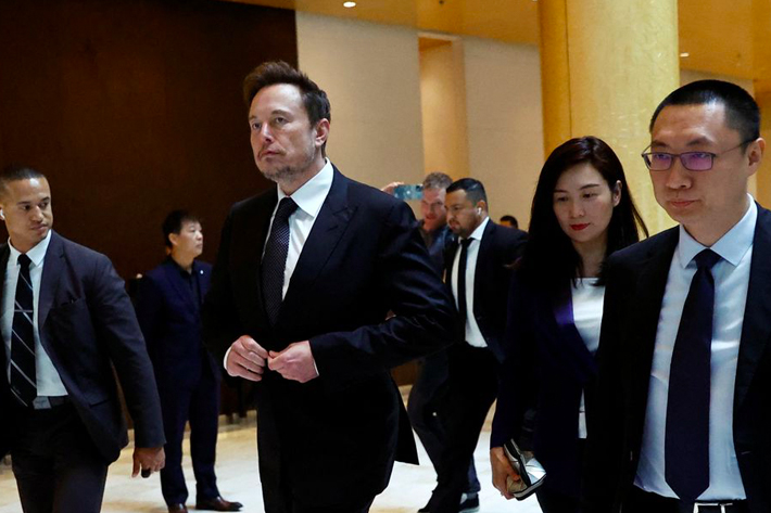 Tesla Chief Executive Officer Elon Musk leaves a hotel in Beijing, China