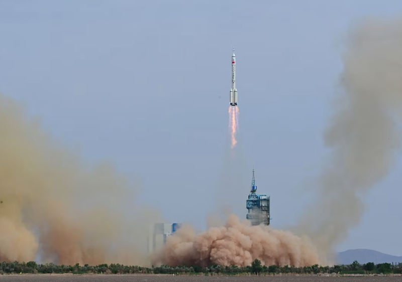 A Long March-2F carrier rocket, carrying the Shenzhou-16 spacecraft and three astronauts, takes off from the launching area of Jiuquan Satellite Launch Center for a crewed mission to China's Tiangong space station, near Jiuquan, Gansu province, China May 30, 2023. China Daily via REUTERS