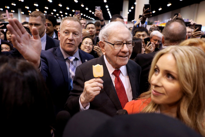 Berkshire Hathaway Chairman Warren Buffett walks through the exhibit hall as shareholders gather to hear from the billionaire investor at Berkshire Hathaway Inc's annual shareholder meeting in Omaha, Nebraska, US