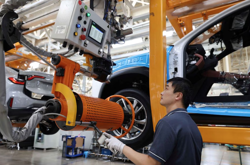 An employee works on the production line of Nio electric vehicles at a JAC-NIO manufacturing plant in Hefei, Anhui province, China August 28, 2022. China Daily via REUTERS