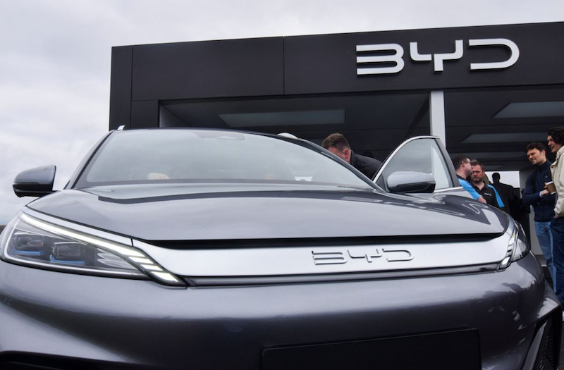 Members of the press and the general public check out the Atto 3 electric SUV made by Chinese carmaker BYD, at the Fully Charged Live electric vehicle trade show in Farnborough, Britain, April 28, 2023. REUTERS/Nick Carey/File Photo