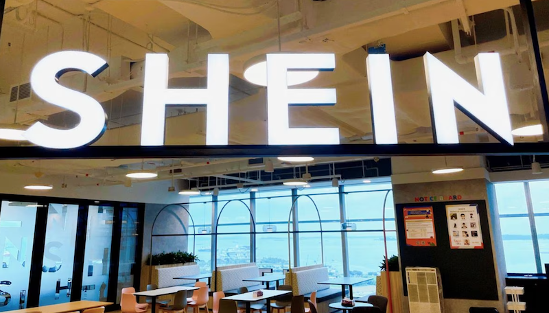 A Shein logo is pictured at the company's office in the central business district of Singapore, October 18, 2022. REUTERS/Chen Lin/File Photo