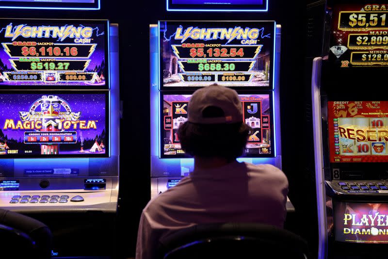 Parliamentary inquiry recommends phasing out ads for online gambling within three years because of the social harm rampant betting is causing.