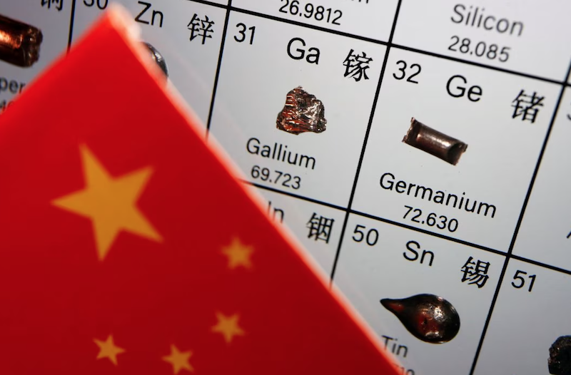 The flag of China is placed next to the elements of Gallium and Germanium on a periodic table, in this illustration picture taken on July 6, 2023. REUTERS/Florence Lo/Illustration