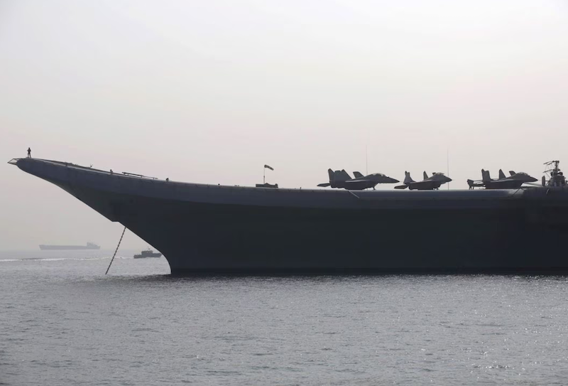 Russian-made MiG-29 aircraft are seen parked on the flight deck of INS Vikramaditya, an Indian Navy aircraft carrier also of Russian make, anchored in the Arabian Sea off the coast of Mumbai, India, December 3, 2015. REUTERS/Shailesh Andrade/File Photo