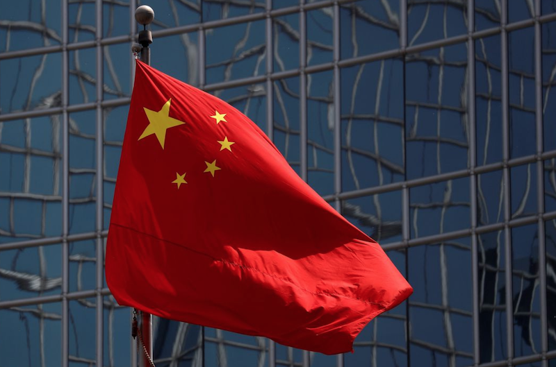 The Chinese national flag is seen in Beijing, China April 29, 2020. REUTERS/Thomas Peter/File Photo