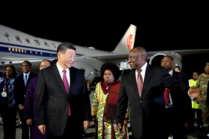Chinese President Xi Jinping meets with South African President Cyril Ramaphosa ahead of the BRICS Summit at OR Tambo International Airport in Johannesburg, South Africa