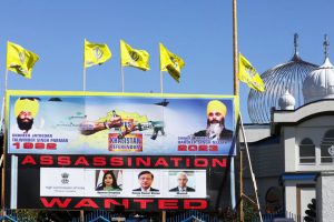 A sign outside the Guru Nanak Sikh Gurdwara temple is seen after the killing on its grounds in June 2023 of Sikh leader Hardeep Singh Nijjar, in Surrey, British Columbia