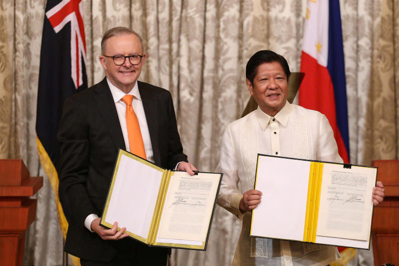 Australian Prime Minister Anthony Albanese, left, and Philippine President Ferdinand Marcos Jr. pose for a photo after signing a strategic partnership at Malacanang Palace in Manila on Friday Sept 8, 2023 (Reuters).