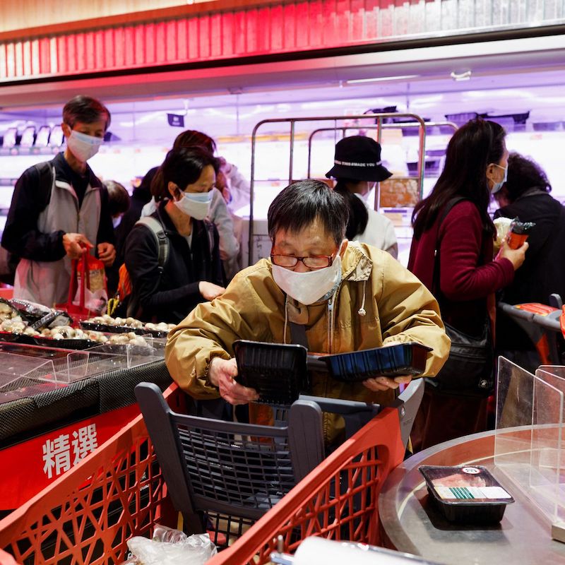 Hong Kongers stock up on food as typhoon Saola nears.