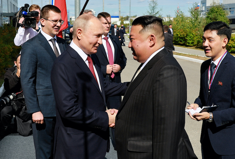 Putin shakes hands with Kim before their tour of Vostochny Сosmodrome in the Russian far east, Sept 13, 2023 (Sputnik via Reuters). 