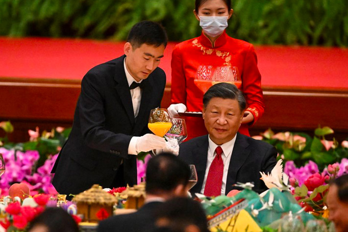 Chinese President Xi Jinping attends a reception dinner at the Great Hall of the People ahead of China's National Day in Beijing, China