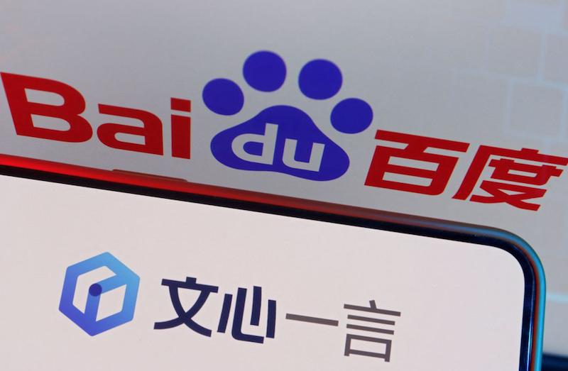 The logo of Baidu's AI chatbot Ernie Bot is displayed near a screen showing the Baidu logo, in this illustration picture taken on June 28, 2023. Photo: Reuters