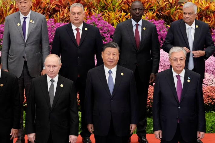 Russian President Vladimir Putin, Chinese President Xi Jinping, Kazakhstan President Kassym-Jomart Tokayev with other leaders gather for a group photo session at the Third Belt and Road Forum at the Great Hall of the People in Beijing, China