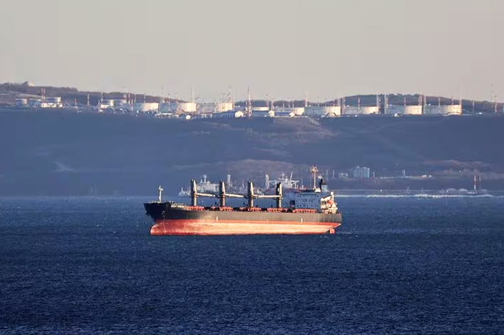 A bulk carrier sails near the crude oil terminal Kozmino in Nakhodka Bay near the port city of Nakhodka, Russia