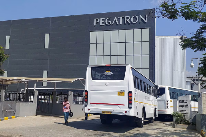 Employee buses enter the Pegatron facility near Chennai, Tamil Nadu, India