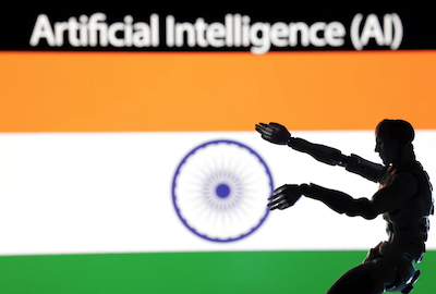 AI Artificial intelligence words, miniature of robot and an Indian flag are seen in this illustration taken December 21, 2023. REUTERS/Dado Ruvic/Illustration/File Photo Purchase Licensing Rights
