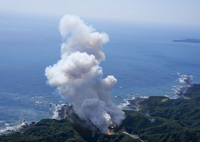 The rocket crashed over a mountainside in Japan's Wakayama Prefecture. Photo: Reuters/Kyodo