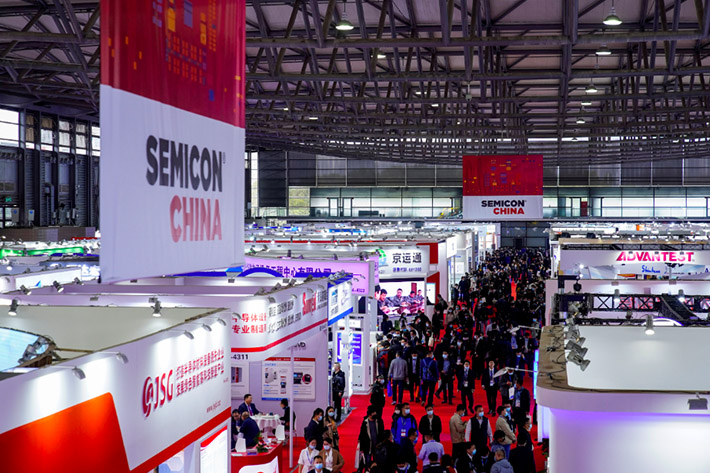 People visit Semicon China, a trade fair for semiconductor technology, in Shanghai, China in 2021