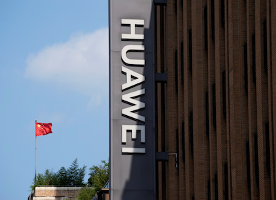 A Chinese flag flutters near a Huawei store in Shanghai, China September 8, 2023. REUTERS/Aly Song/ File photo Purchase Licensing Rights