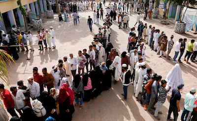 Voters line up outside a polling station to vote during the first phase of the general election in Kairana, in the northern Indian state of Uttar Pradesh, India. REUTERS/Anushree Fadnavis Purchase Licensing Rights