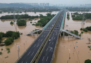 Record Rains See Floods Swamp China’s ‘Factory Floor’