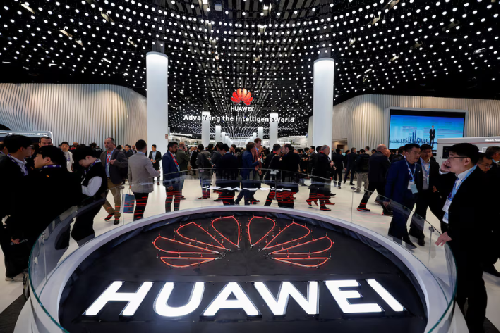 People visit the Huawei stand at the 2024 Mobile World Congress (MWC) in Barcelona, Spain