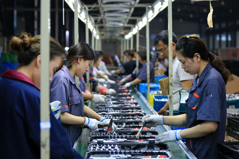 Foreign Orders Lift China’s Manufacturing Again in March: Caixin