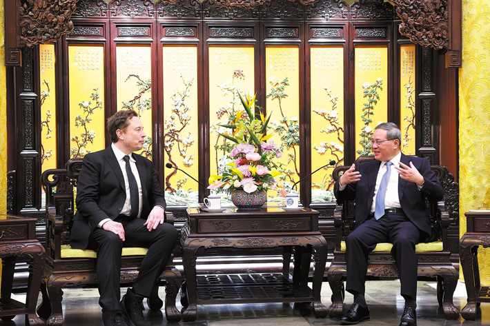 Tesla chief Elon Musk in his meeting with Chinese Premier Li Qiang in April 2024