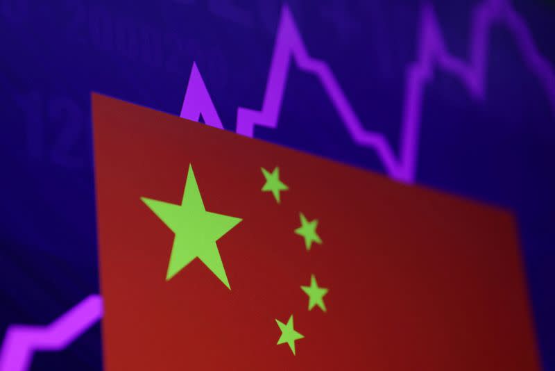 The Chinese flag is seen with stock graph