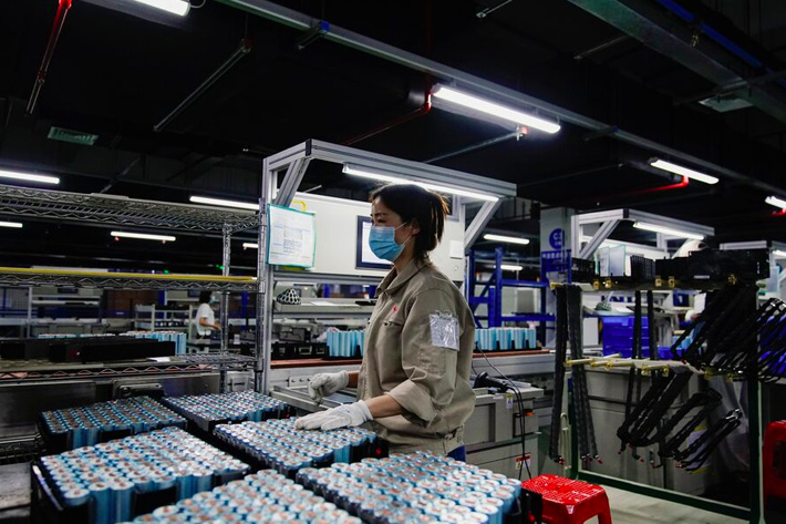 An employee works on the production line of electric vehicle (EV) battery manufacturer Octillion in Hefei, Anhui province, China