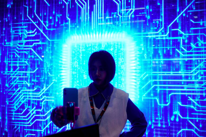 A woman visits a semiconductor device display in China