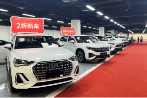 New cars are advertised for sale at deep discounts in the Zcar showroom in Chengdu, China 